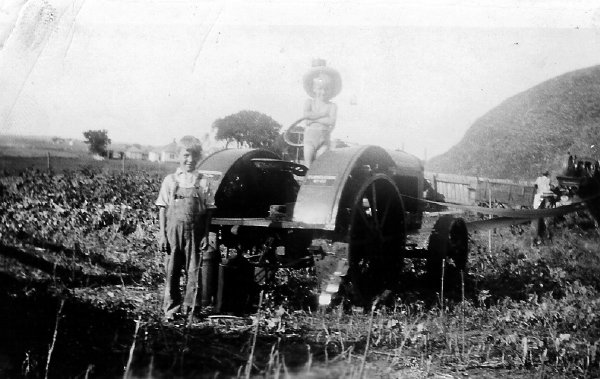 041 Harvey and Howard Dahlheimer with the tractor, 1935