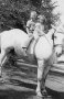 053 Howard Dahlheimer and Marlene (Dahlheimer) Reinking, on a horse, 1943